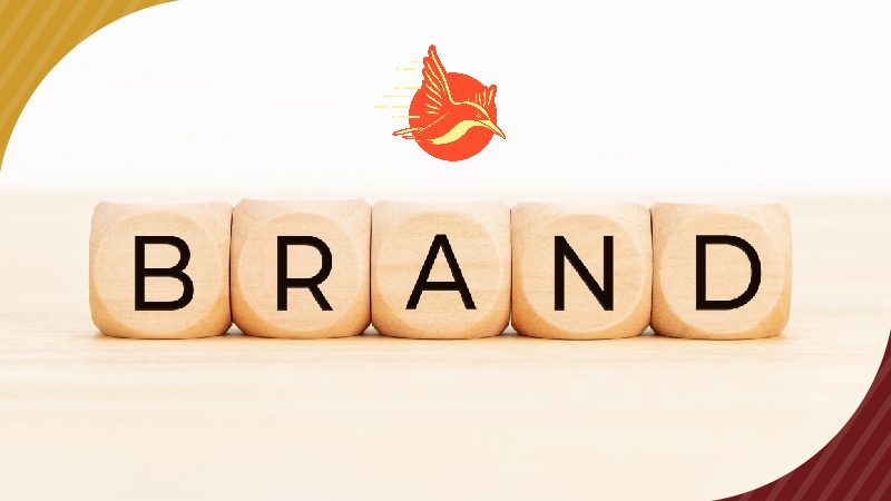 Cubes with the word "brand" and a megaphone symbol showcasing the importance of brand registration on Amazon, 'Be Brand Registered on Amazon'